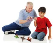 Play Therapy - boy with dinosaurs